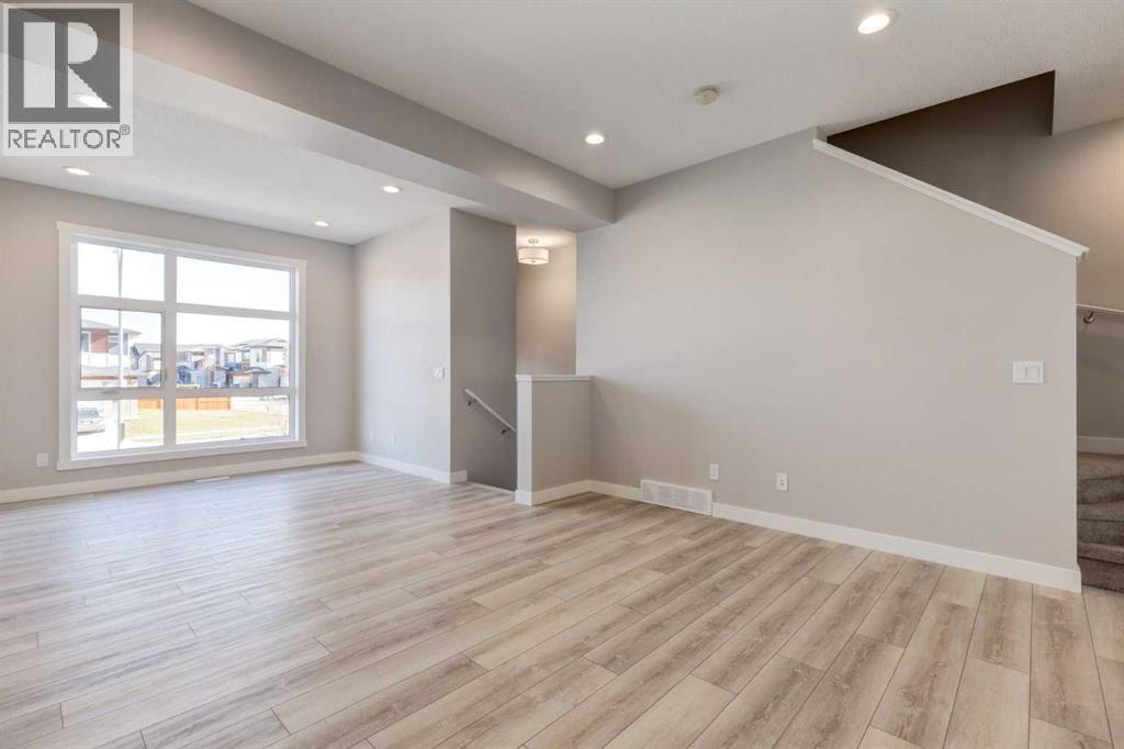 156 Walden Lane SE, Calgary, Alberta  T2X 2A7 - Photo 4 - A2345580