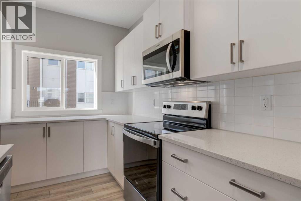 156 Walden Lane SE, Calgary, Alberta  T2X 2A7 - Photo 7 - A2345580