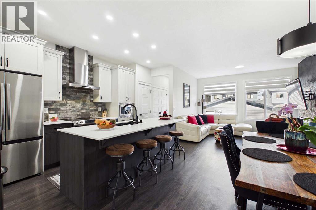 24 Rowmont Common NW, Calgary, Alberta  T3L 0L3 - Photo 6 - A2345530