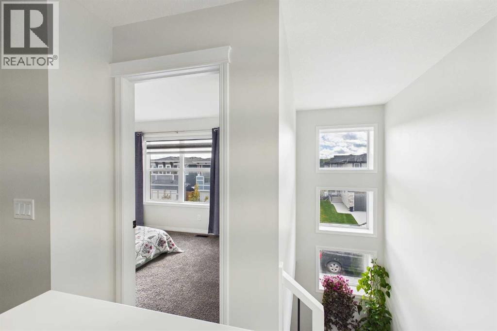 24 Rowmont Common NW, Calgary, Alberta  T3L 0L3 - Photo 17 - A2345530