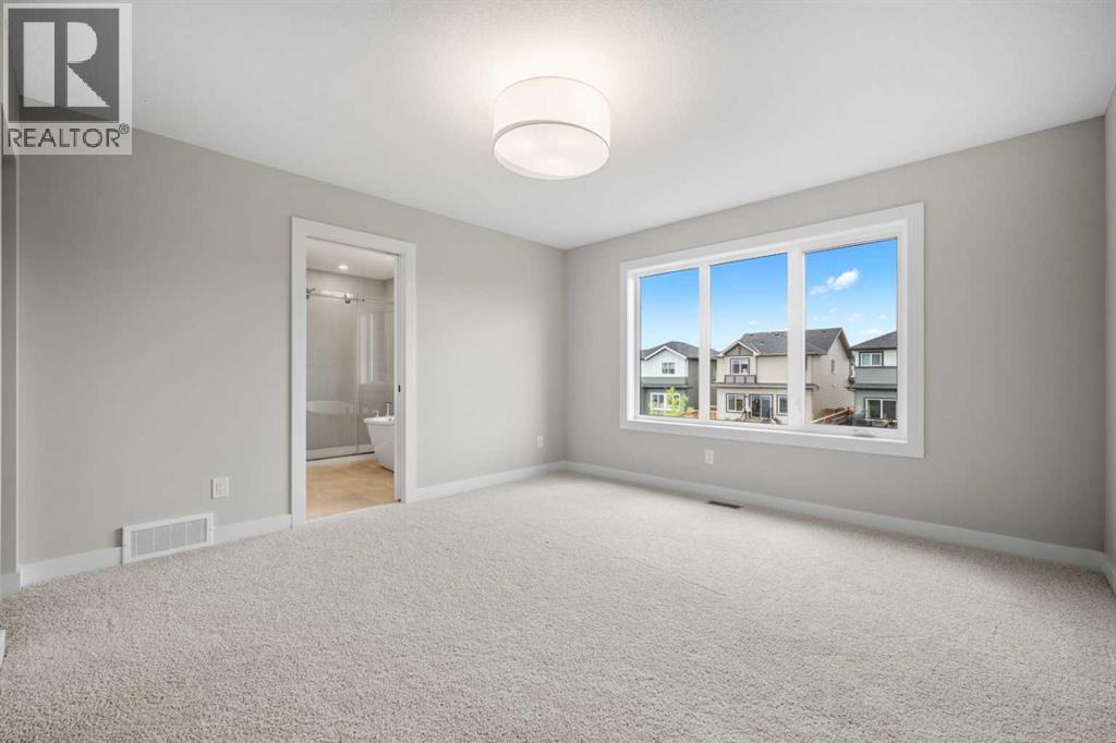 116 Quartz Crescent, Cochrane, Alberta  T4C 3G2 - Photo 23 - A2346327