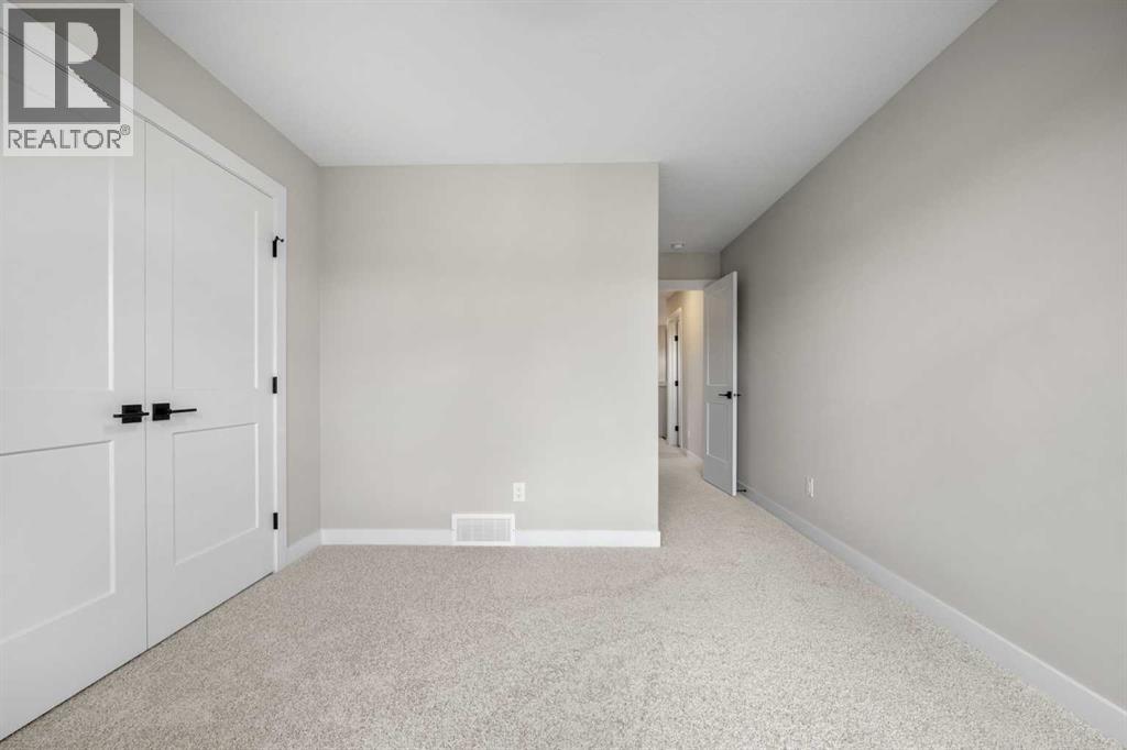 116 Quartz Crescent, Cochrane, Alberta  T4C 3G2 - Photo 29 - A2346327