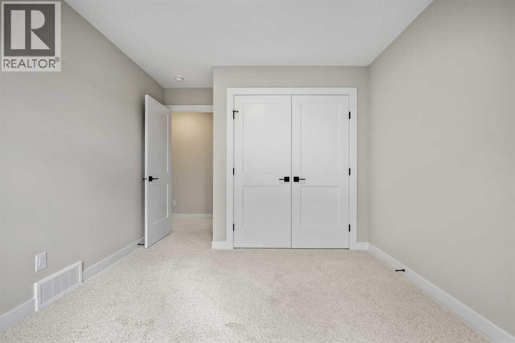 116 Quartz Crescent, Cochrane, Alberta  T4C 3G2 - Photo 31 - A2346327