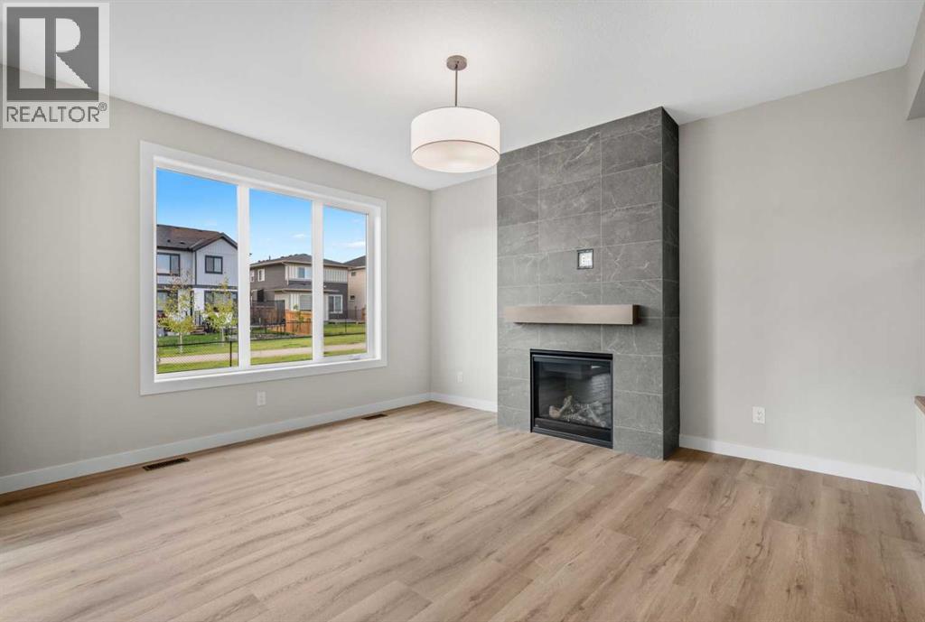 116 Quartz Crescent, Cochrane, Alberta  T4C 3G2 - Photo 6 - A2346327