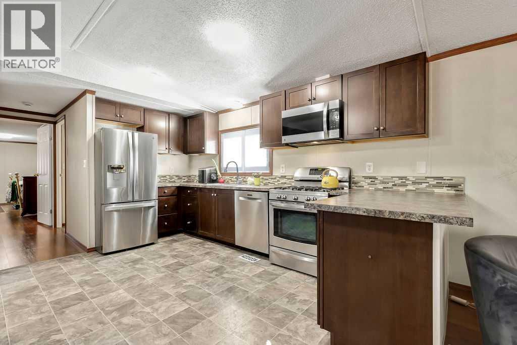 105, 6724 17 Avenue Se, Calgary, Alberta  T2A 0W5 - Photo 6 - A2344329