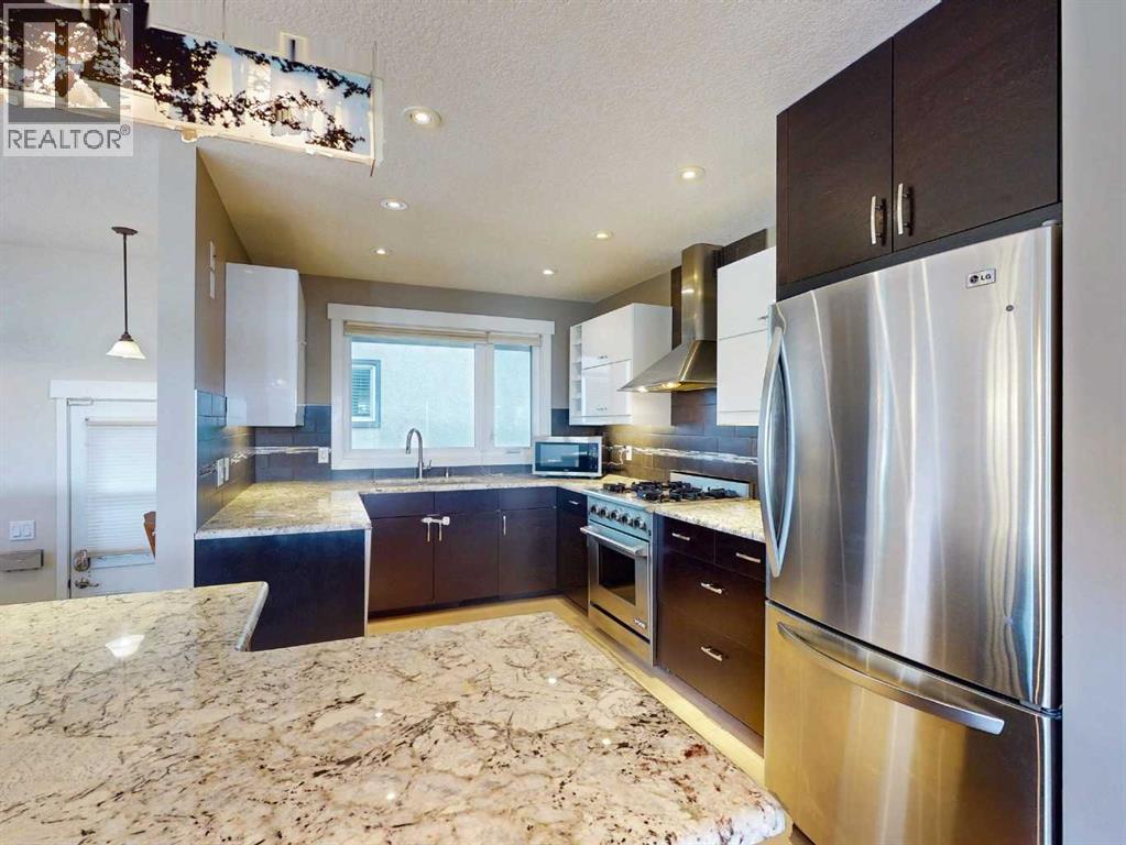23 Brown Crescent NW, Calgary, Alberta  T2L 1N4 - Photo 11 - A2343290