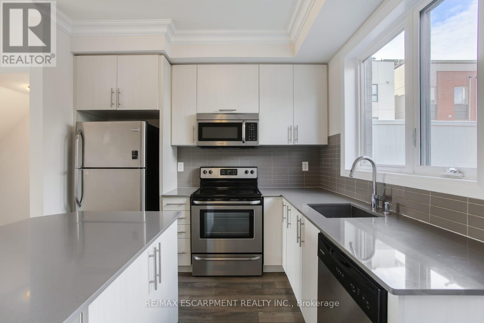 2 - 130 Frederick Tisdale Drive, Toronto, Ontario  M3K 0A5 - Photo 6 - W13803412