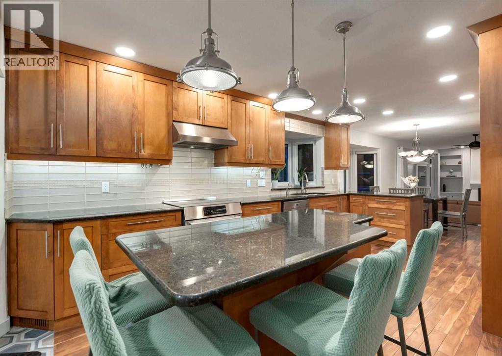 871 Oakside Circle Sw, Calgary, Alberta  T2V 4P6 - Photo 8 - A2346074