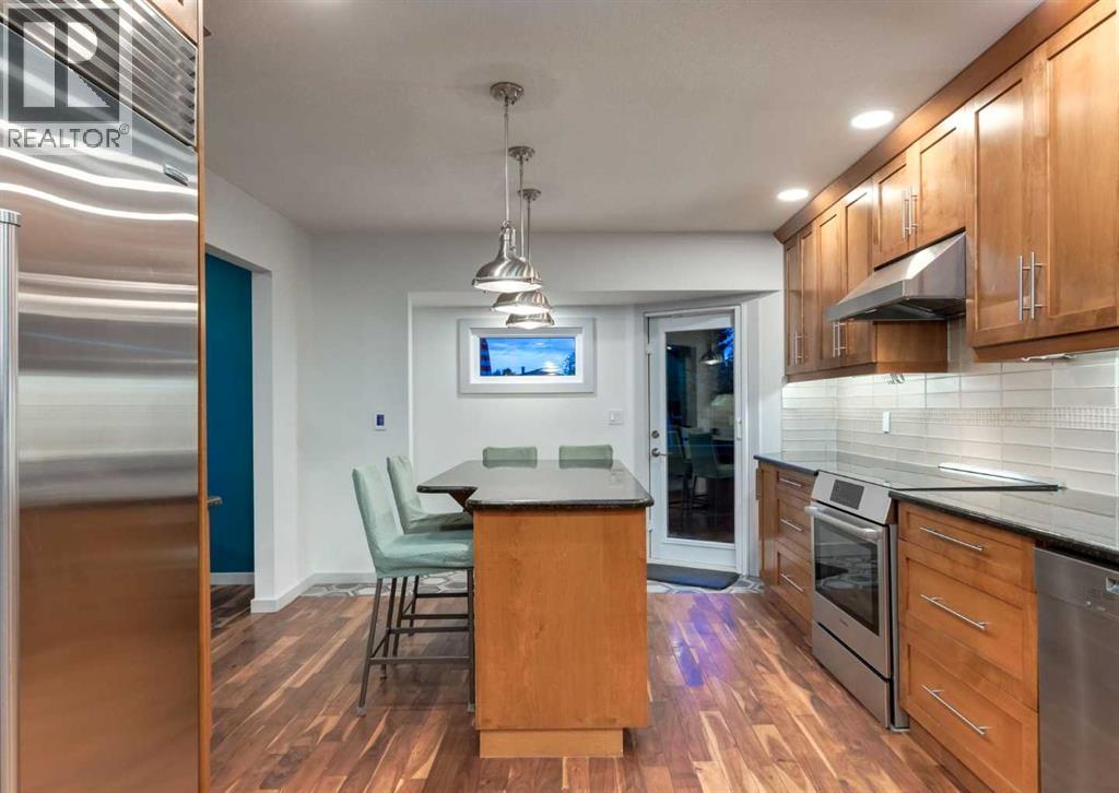 871 Oakside Circle Sw, Calgary, Alberta  T2V 4P6 - Photo 11 - A2346074