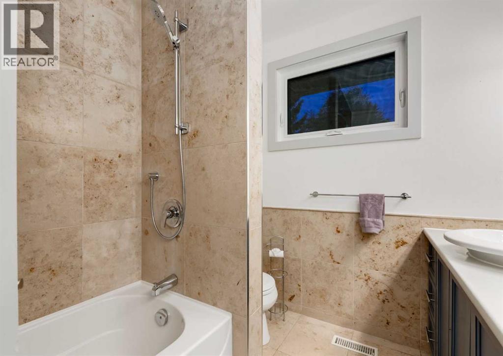 871 Oakside Circle Sw, Calgary, Alberta  T2V 4P6 - Photo 31 - A2346074