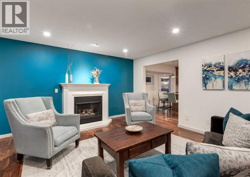 871 Oakside Circle Sw, Calgary, Alberta  T2V 4P6 - Photo 4 - A2346074