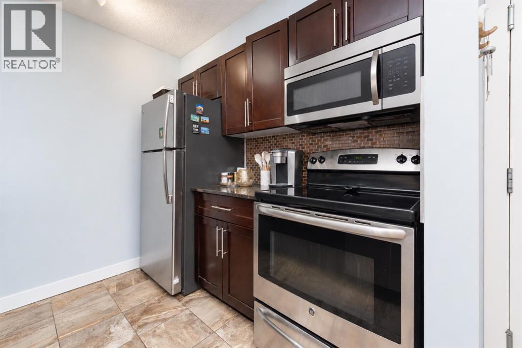 8112, 403 Mackenzie Way Sw, Airdrie, Alberta T4B 3Y7 - Photo 8 - A2343820