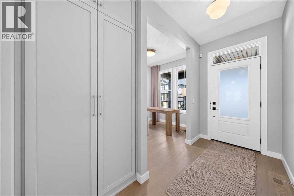 115 Bluerock Avenue SW, Calgary, Alberta  T2Y 0V3 - Photo 4 - A2343383