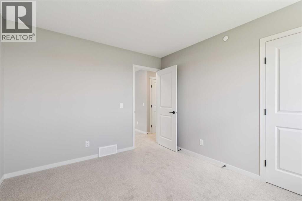 386 Hotchkiss Manor SE, Calgary, Alberta  T3S 0J9 - Photo 30 - A2321204