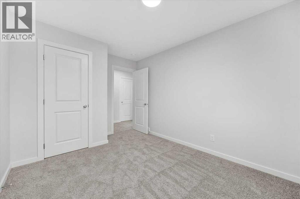 75 Versant Rise SW, Calgary, Alberta  T2Y 0Z1 - Photo 31 - A2345854