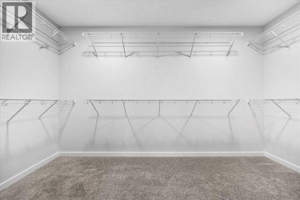 75 Versant Rise SW, Calgary, Alberta  T2Y 0Z1 - Photo 27 - A2345854
