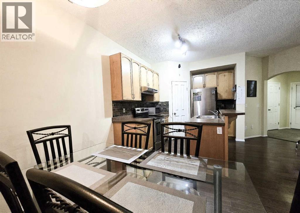 13 Tuscany Ridge Mews NW, Calgary, Alberta  T3L 3B7 - Photo 7 - A2339238