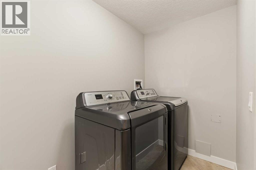 246 Woodpark Green SW, Calgary, Alberta T2W 6E9 - Photo 41 - A2345776