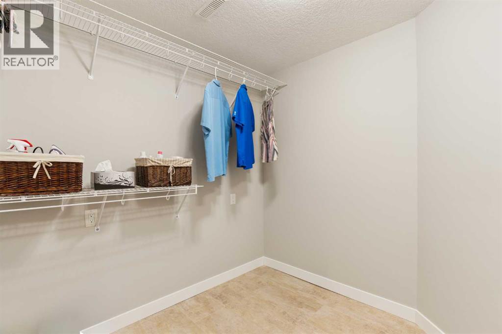 246 Woodpark Green SW, Calgary, Alberta T2W 6E9 - Photo 42 - A2345776