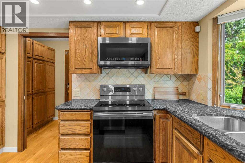 72 Woodacres Crescent Sw, Calgary, Alberta  T2W 4V6 - Photo 14 - A2342156