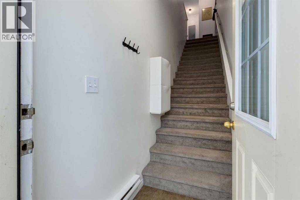 26 Auburn Bay Common Se, Calgary, Alberta  T3M 0M3 - Photo 4 - A2343592
