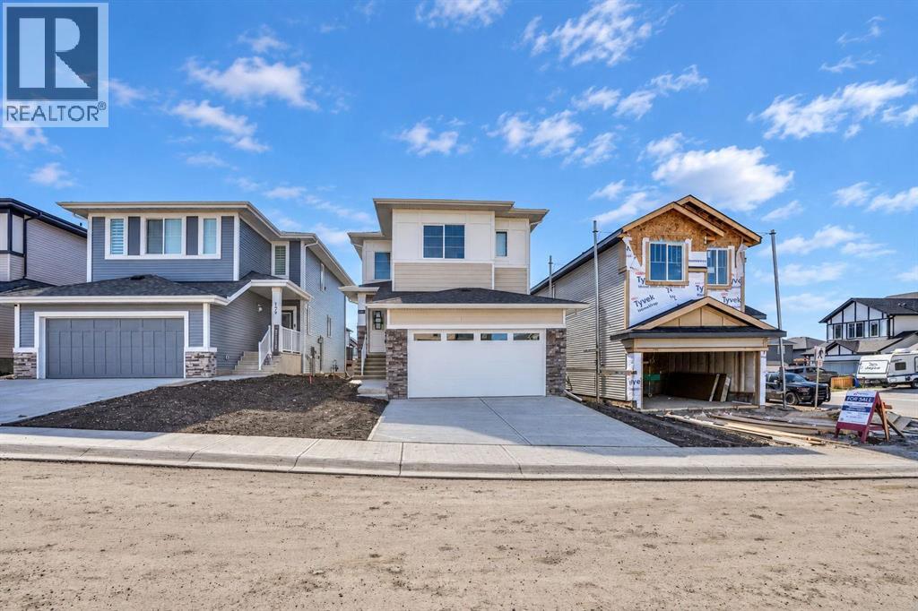 183 Heritage Court, Cochrane, Alberta  T4C 2N5 - Photo 3 - A2334122