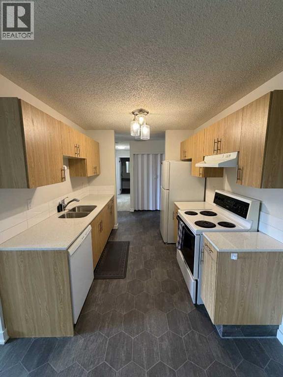 303, 85 Foxbend Crescent N, Lethbridge, Alberta  T1H 5T4 - Photo 7 - A2346569