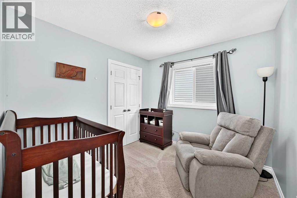 10 Reunion Grove Nw, Airdrie, Alberta  T4B 0Z7 - Photo 17 - A2346636