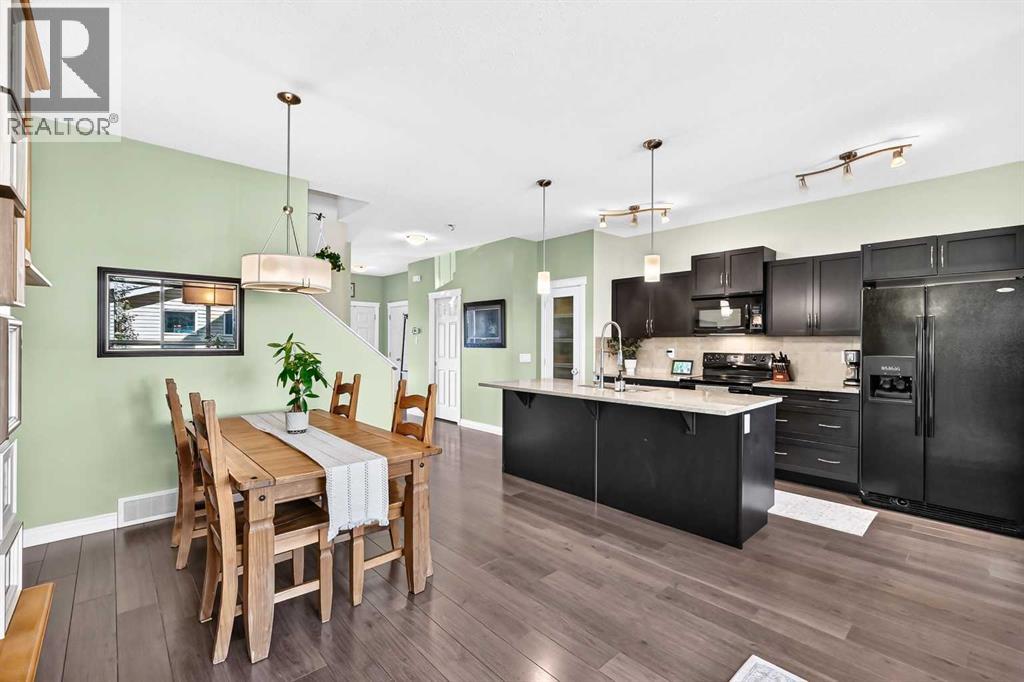10 Reunion Grove Nw, Airdrie, Alberta  T4B 0Z7 - Photo 8 - A2346636