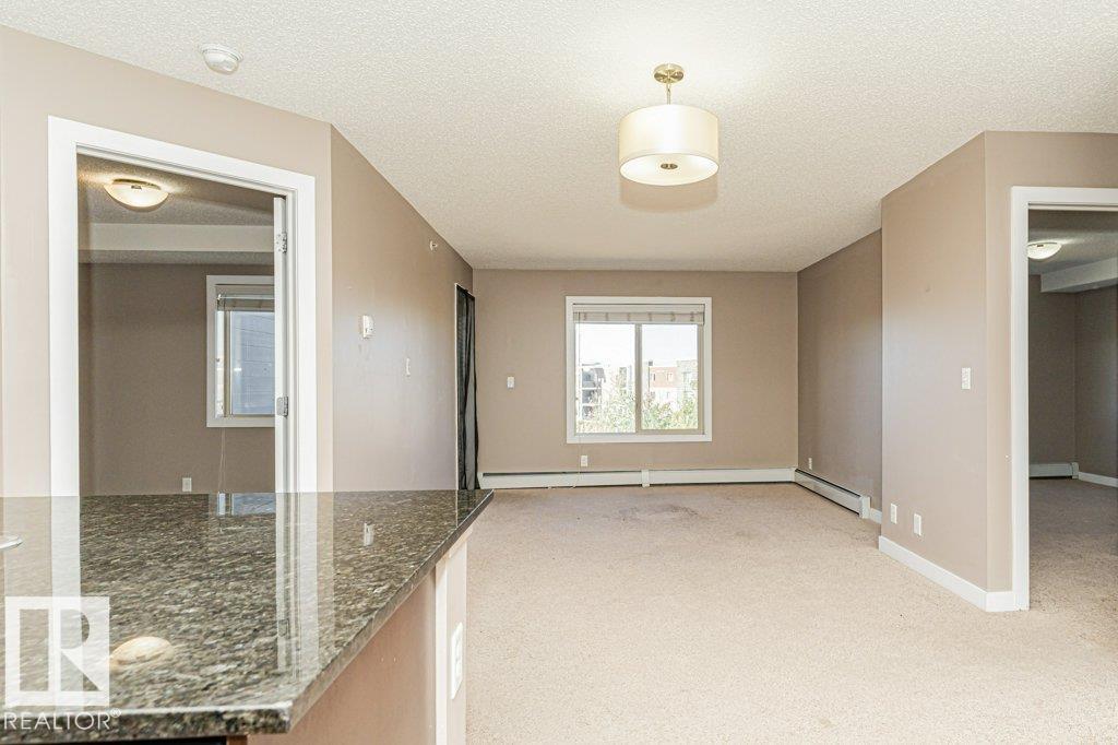 #405 11804 22 AV SW