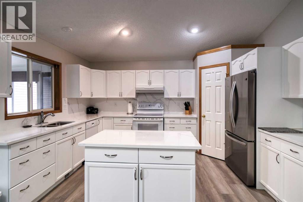 11 Wenstrom Crescent NE, Langdon, Alberta  T0J 1X1 - Photo 10 - A2346382
