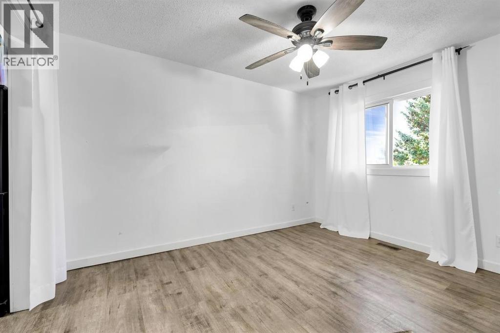 84a Cedarwood Hill SW, Calgary, Alberta  T2W 3H5 - Photo 6 - A2345041