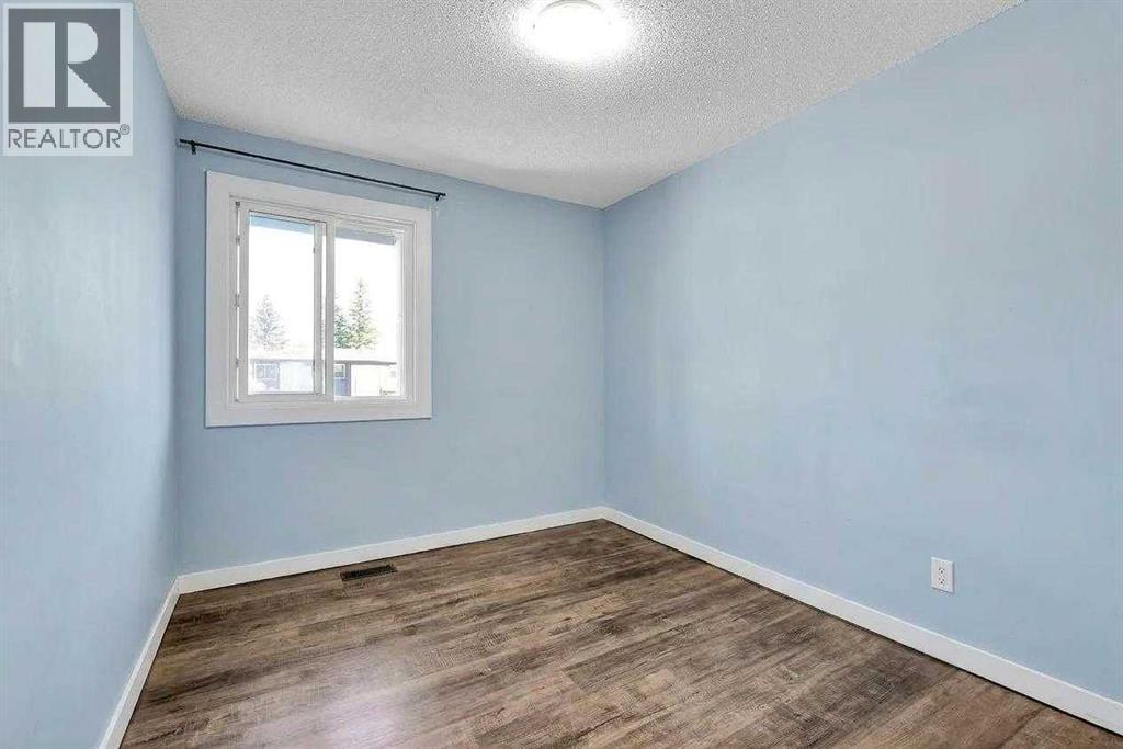 84a Cedarwood Hill SW, Calgary, Alberta  T2W 3H5 - Photo 7 - A2345041