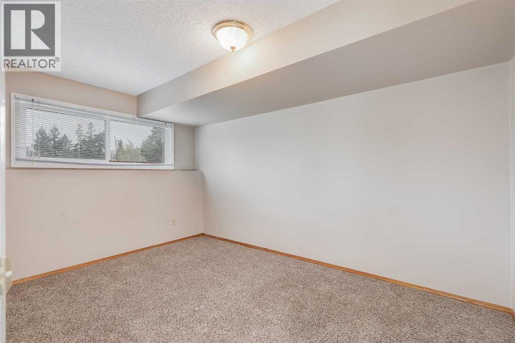 1418 Ranchlands Way Nw, Calgary, Alberta  T3G 1R2 - Photo 19 - A2343245