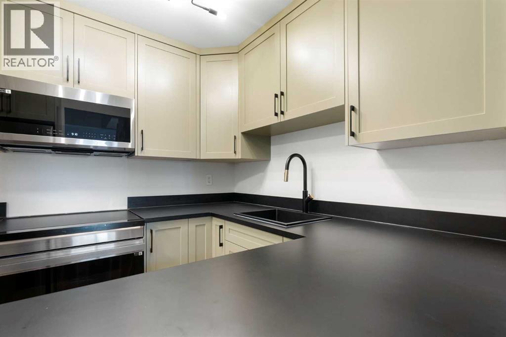 2136, 70 Glamis Drive Sw, Calgary, Alberta  T3E 6T6 - Photo 4 - A2345339