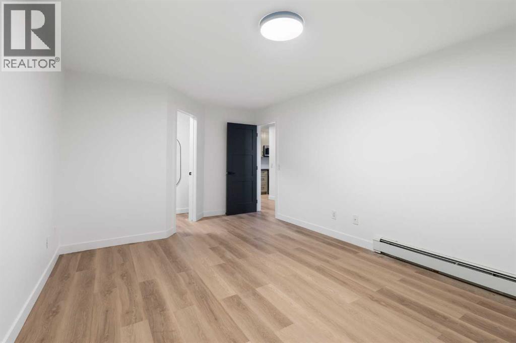2136, 70 Glamis Drive Sw, Calgary, Alberta  T3E 6T6 - Photo 14 - A2345339