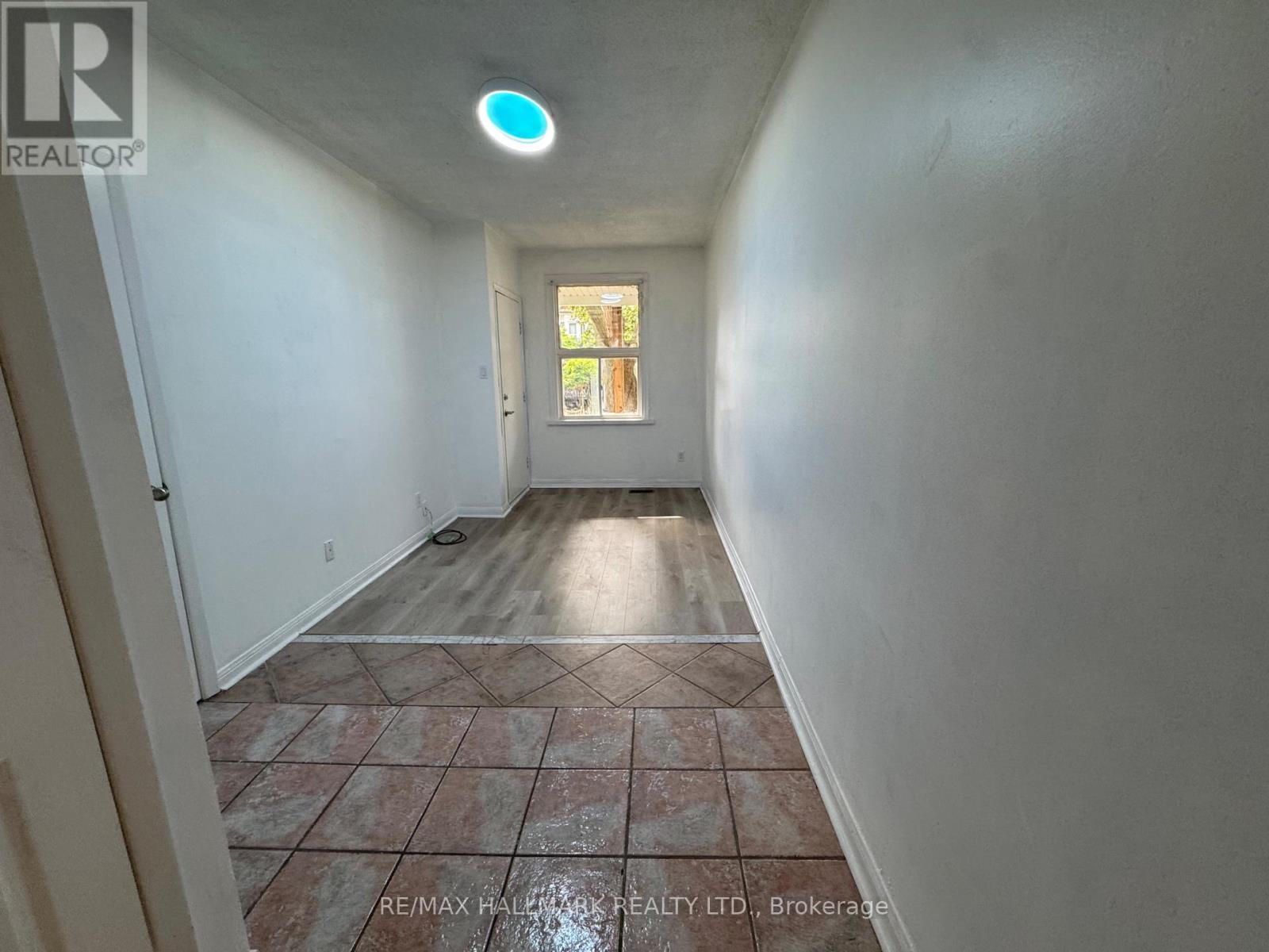 Main Floor - 57 Hiawatha Road, Toronto, Ontario  M4L 2X7 - Photo 4 - E13806664