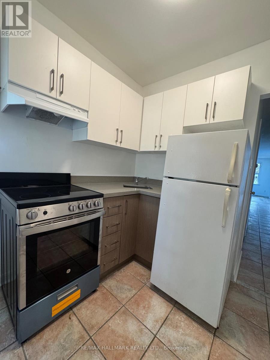 Main Floor - 57 Hiawatha Road, Toronto, Ontario  M4L 2X7 - Photo 8 - E13806664