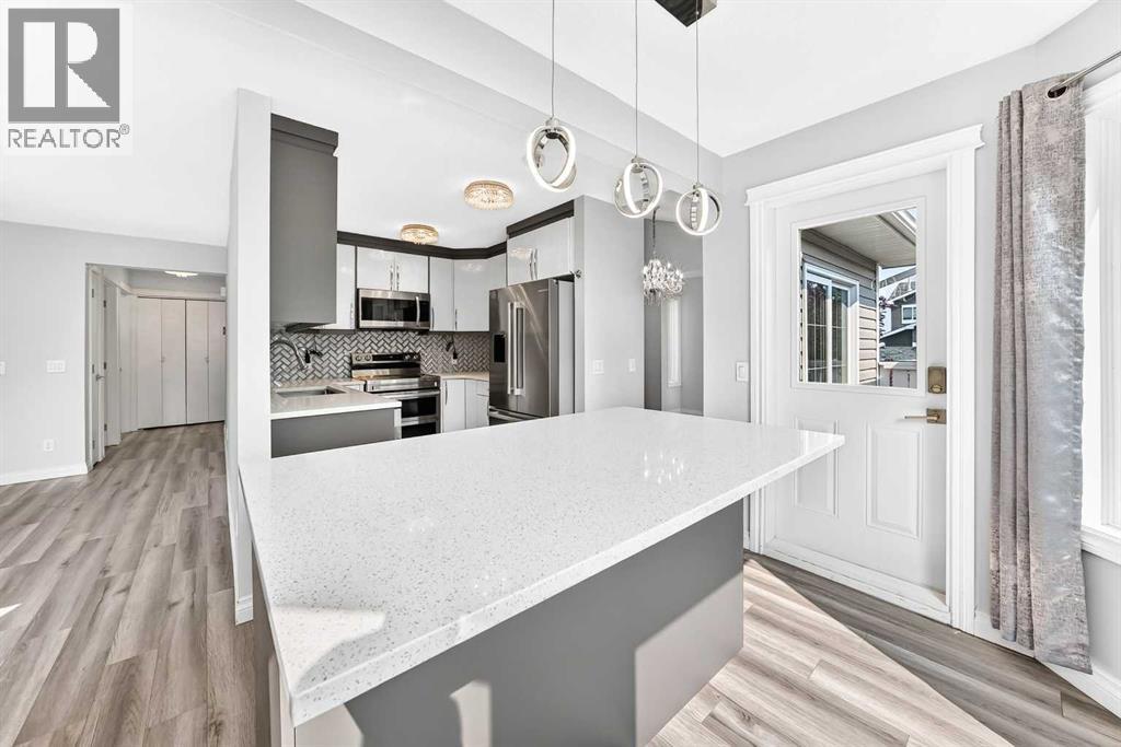 147 Macewan Drive Nw, Calgary, Alberta  T3K 3G5 - Photo 4 - A2335966