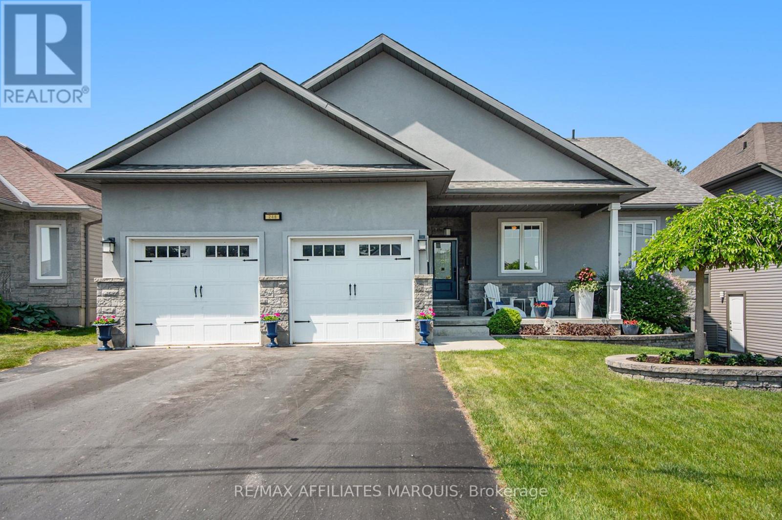 An exceptional home, built to high quality specifications. This spectacular walk-out back bungalow is sure to please with 1860 sq ft finished, on both levels. From the covered front porch, a welcoming foyer greets you next to an essentials home office (alternately a 3rd main level bedroom with a closet). Move to the open concept living room with its beautiful feature wall & gas fireplace. The spacious open dining area also offers access to the upper-level deck with a retractable awning & sunscreen. Next you will love the gourmets delight kitchen with an abundance of higher end cabinetry, a breakfast island bar & granite countertops. The kitchen is complimented with stainless steel appliances including a 3-door fridge, stove, microwave/hood-fan & dishwasher. There is an inside access door to the garage, a main floor laundry room with washer and dryer, a main level 3-piece bathroom plus a 2nd guest bedroom. Next take in the pampering master suite with a generous walk-in closet, a 5-piece ensuite with a soaker tub, a separate glass shower stall, a makeup vanity with lighted mirror & convenient double sinks. Head down the showcase stairwell to the finished lower-level family room . Moving through to the playroom & then onto the games room area with a door leading to the lower-level patio & private back yard. There is a 3rd bathroom, a 4th bedroom, a utility storage rm. & a cold storage rm. This lovely home offers tile & hardwood flooring throughout the main level with tile & laminate flooring on the lower level. For added comfort & efficiency, the lower-level floor & upper-level ceramic tile are heated by radiant hot water heating plus there is also a forced air furnace with central air conditioning. Other features including high ceilings on both levels, a Natural Gas on-demand hot water supply, 2 Natural gas BBQs connected, a well landscaped yard, a twin door 2 car oversized garage, aristocrat stone & stucco exterior plus a wide driveway. Note the home is now vacant. (id:48254)