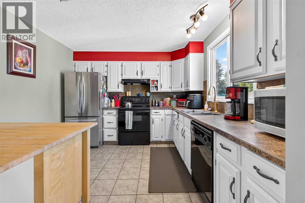 7 Woodbrook Way Sw, Calgary, Alberta  T2W 4J7 - Photo 12 - A2346273