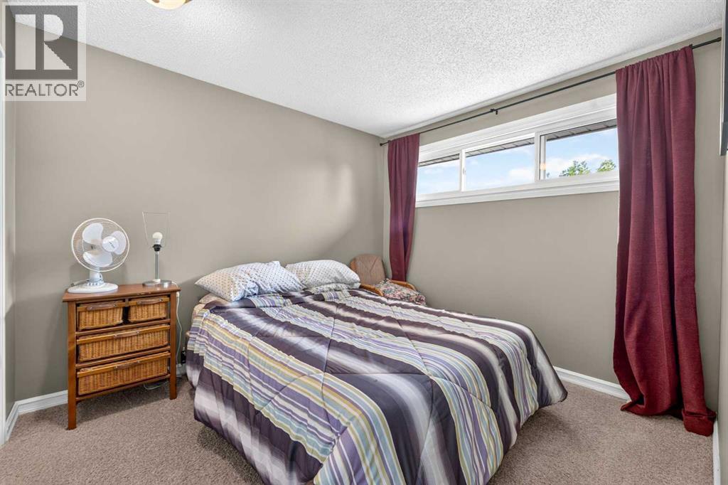 7 Woodbrook Way Sw, Calgary, Alberta  T2W 4J7 - Photo 25 - A2346273