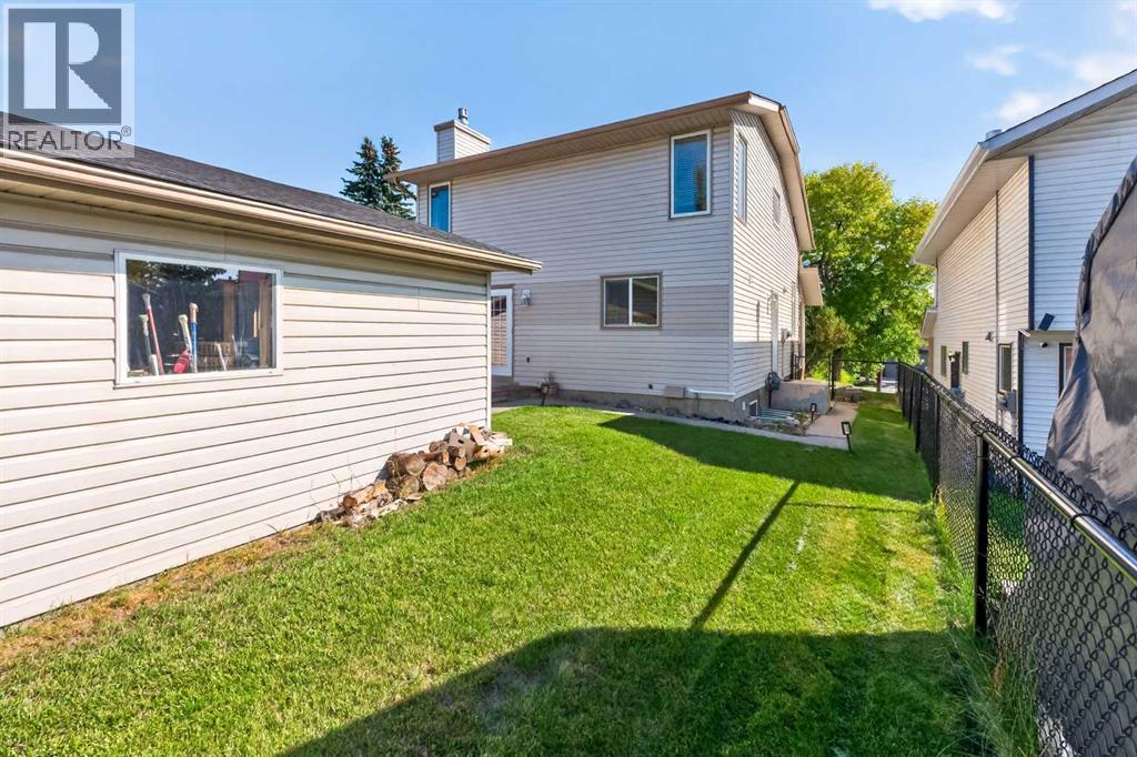 7 Woodbrook Way Sw, Calgary, Alberta  T2W 4J7 - Photo 33 - A2346273