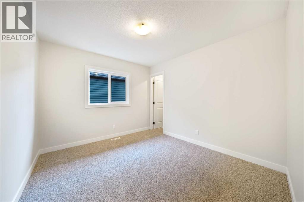 14 Rivercrest Common, Cochrane, Alberta  T4C 2V2 - Photo 28 - A2343301