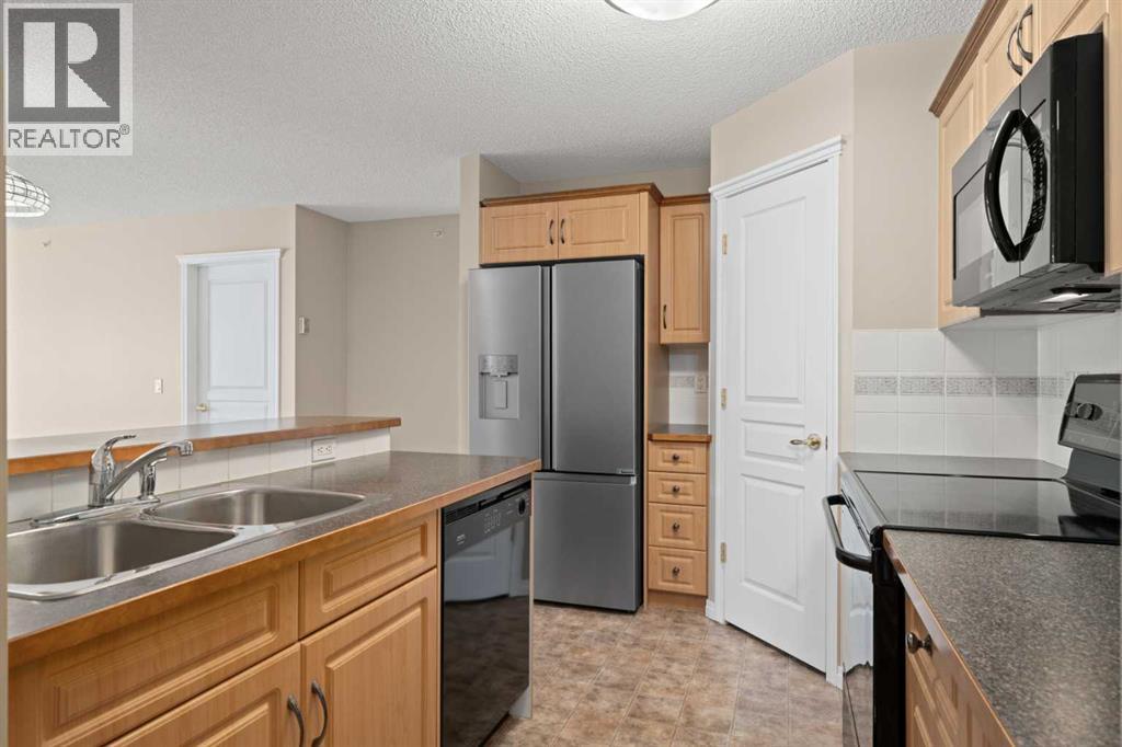 411, 40 Parkridge View SE, Calgary, Alberta  T2J 7G6 - Photo 10 - A2343804