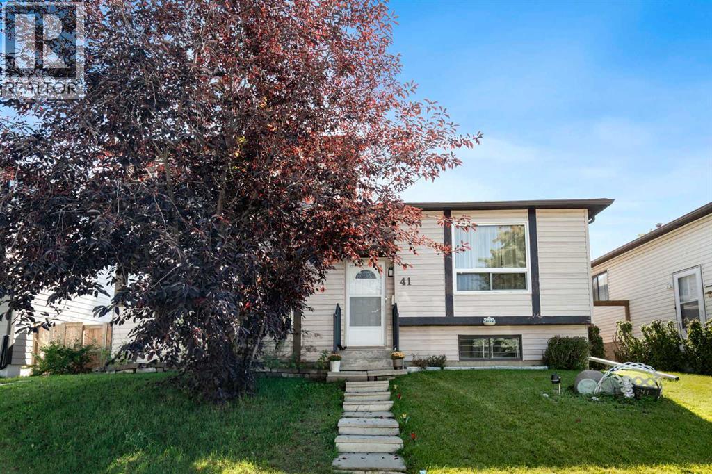 41 Cedardale Road SW, Calgary, Alberta  T2W 5A7 - Photo 1 - A2346690
