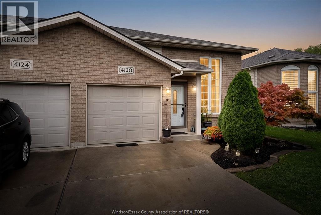 Welcome to 4130 St. Clair Avenue! This well-maintained 3-bedroom, 2-bathroom semi-detached townhouse offers over 1,800 sq.ft of living space, updates and location buyers are looking for. Bright and spacious open-concept main floor with an updated kitchen (2018), flooring & crown moulding. Main floor windows replaced in 2022. Primary bedroom features beautiful maple hardwood flooring. The lower level offers excellent additional living space with a large family room, 3rd bedroom, 3pc bathroom and a convenient grade-level entrance with patio doors leading directly to the backyard. Enjoy the privacy of no rear neighbours and a fully fenced yard (2018). Peace of mind with updated plumbing — no Kitec — and a newer sump pump (2025). Conveniently located near Windsor Crossings outlet mall plus the new shopping development including Tim Hortons, Shoppers Drug Mart, Food Basics, etc. Walking distance to St. Clair College with easy access to Highway 3 and the 401. A wonderful opportunity for first-time buyers, downsizers or those looking for a low-maintenance home in a growing LaSalle location. Nothing to do but move in and enjoy! (id:48254)