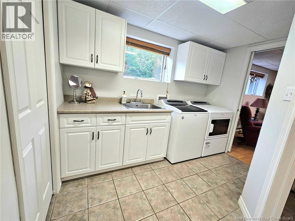 251 Landry, Beresford, New Brunswick  E8K 1G9 - Photo 46 - NB148226
