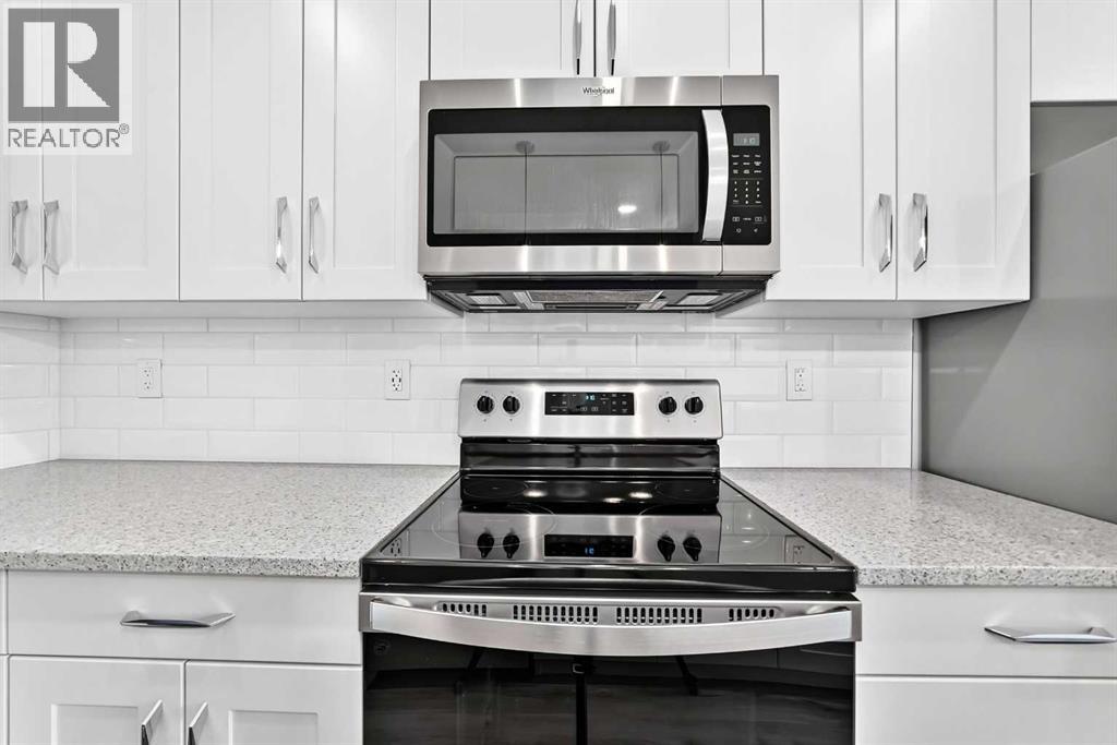 205, 71 Shawnee Common SW, Calgary, Alberta  T2Y 0R2 - Photo 6 - A2345208