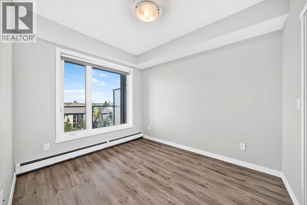205, 71 Shawnee Common SW, Calgary, Alberta  T2Y 0R2 - Photo 13 - A2345208